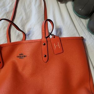 Reversible authenticity coach purse